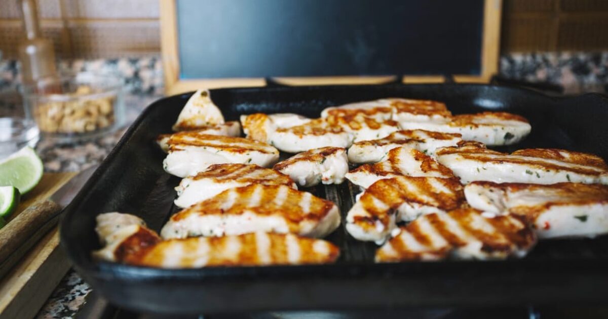 Chicken tenderloins on stove